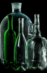 glass bottle, empty, original, on black background