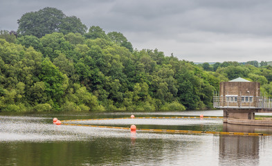 Control tower and sinkhole on Tittesworth Rerservoir, Peak District, UK