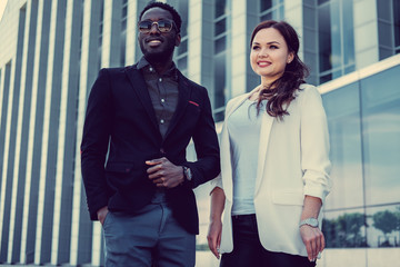 Modern black man and caucasian woman.