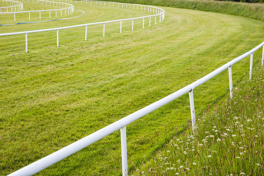  railing bend turn of a horse race track
