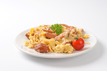 scrambled eggs with sliced sausage