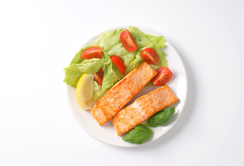 salmon fillets with vegetable garnish