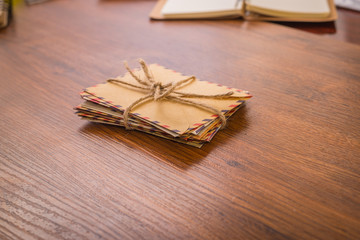 Bundle envelopes on a wood table