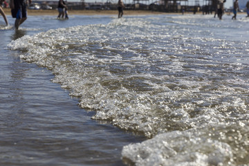 Fototapeta premium The crest of the waves on the beach of the Caspian Sea near Baku
