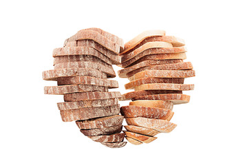 Two stacks of sliced bread in a heart shape on white background. Isolated. Concept art. Food background. Black rye bread and white bread.