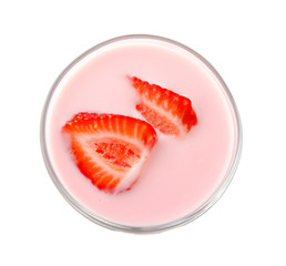 Strawberry yogurt in glass isolated on white background with clipping path. Top view.