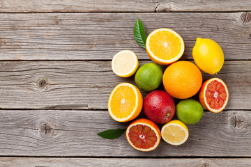 Fototapeta na wymiar Fresh ripe citruses. Lemons, limes and oranges
