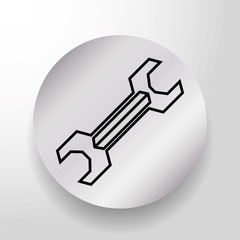 Wrench tool on round button icon