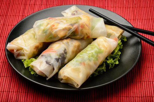 Spring rolls with vegetables and chicken - traditional vietnamese cuisine.