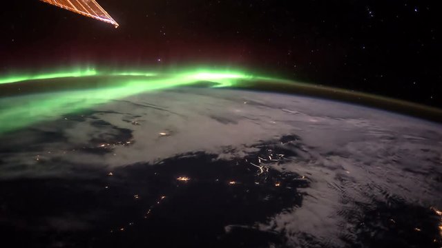Planet Earth at night seen from the ISS. Elements of this video furnished by NASA