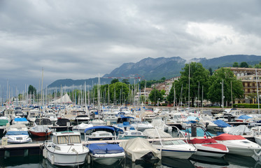 Fototapeta na wymiar Marina of Evian-les-Bains on Leman lake. France