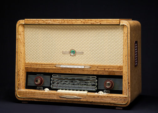 Old vintage radio on a dark background