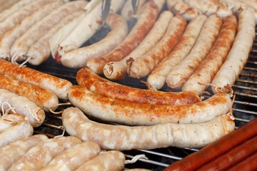 Street fast food, grilled sausages at bbq