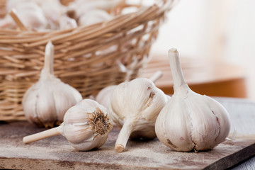 Garlic on wooden table.