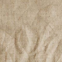 Old canvas, beige fabric texture, background.