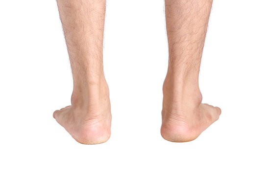 man feet isolated on white background