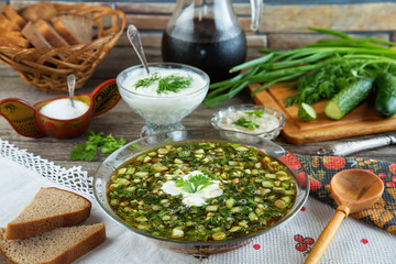 Traditional summer cold soup okroshka with kvass