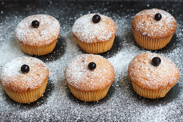 Muffins with black currant sprinkled