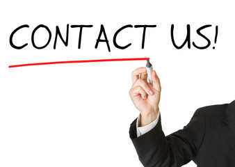 Businessman in suit drawing the text 'contact us'