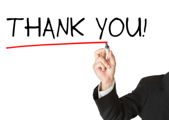 Businessman in suit drawing the word 'thank you'