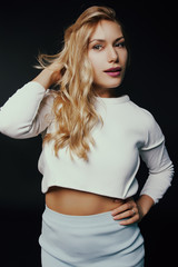 Sexy and beautiful girl in elegant summer suit. cheerful girl sm