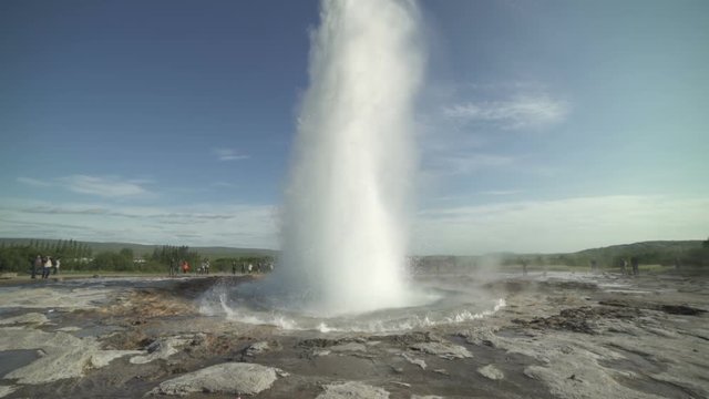 Strokkur Geyser erupting in Iceland