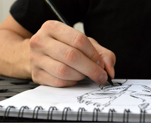 Obraz premium Man's hand drawing pencil sketch