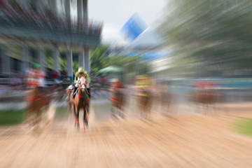 Motion blurred race horse action