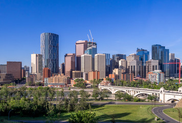 Naklejka premium Calgary's skyline on a beautiful spring day. Calgary is the corporate centre of the oil industry in Canada.