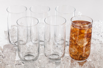 set of glass cups with drink