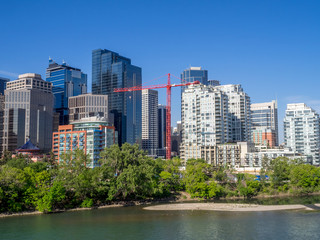 Fototapeta na wymiar Calgary's skyline on a beautiful spring day. Calgary is the corporate centre of the oil industry in Canada.