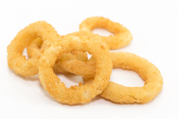 Deep fried onion ring on white background with copy space.