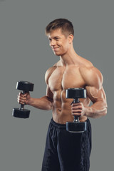 Fototapeta premium Male doing biceps exercises.