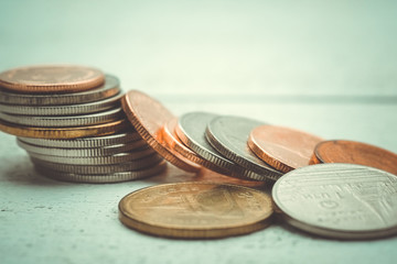 business finance. save money for investment concept coins with f