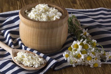 Cottage cheese and chamomile flowers