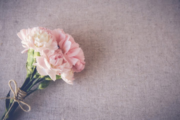 Pink carnation flowers bouquet copy space toning background