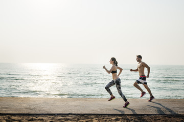 Couple Running Outdoors Beach Concept