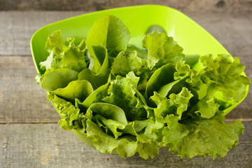 Organic food. ingredients for saladon old, rustic, wooden table.