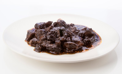 stewed dish with squid in its ink