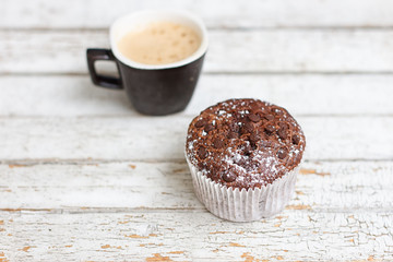 chocolate muffin and cup of coffee