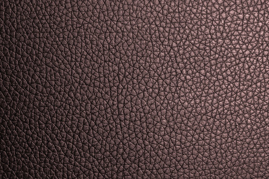 Closeup red brown leather texture. leather background. and leather surface for design. Leather skin with copy space for text or image. © phanthit malisuwan