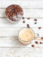 chocolate muffin and cup of coffee