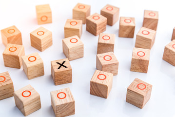 leadership concept with wooden geometric shapes cube