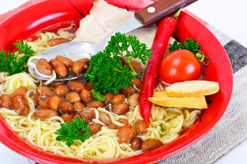 Soup with Beans and Noodles on Ham