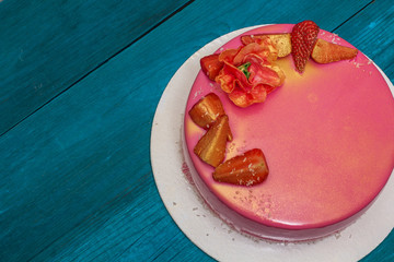 mousse cake decorated with strawberries