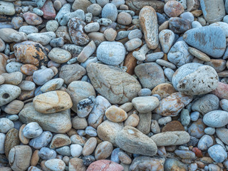 Abstract background with pebbles-round sea stones.