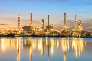 Obraz na płótnie Canvas Oil refinery plant at dusk. Can use for energy concept background.