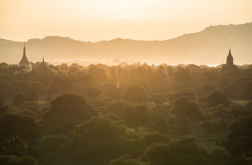 Sunset over the landscape of Bagan plains the ancient empire of Myanmar.