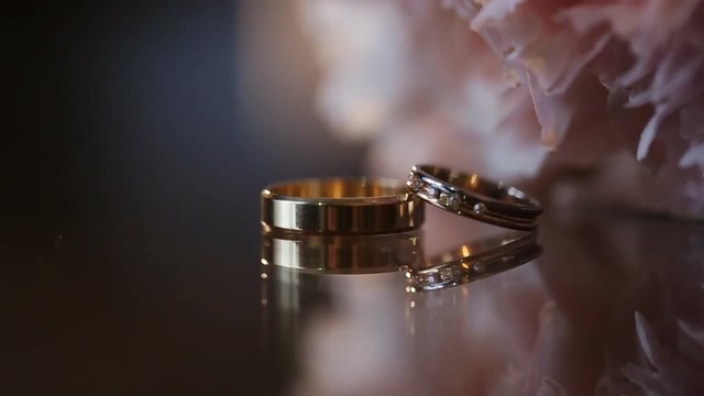 Wedding ring near a beautiful bouquet