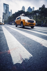 NY cab running in the street
